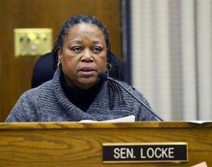 Senator Locke asking question to presenter.